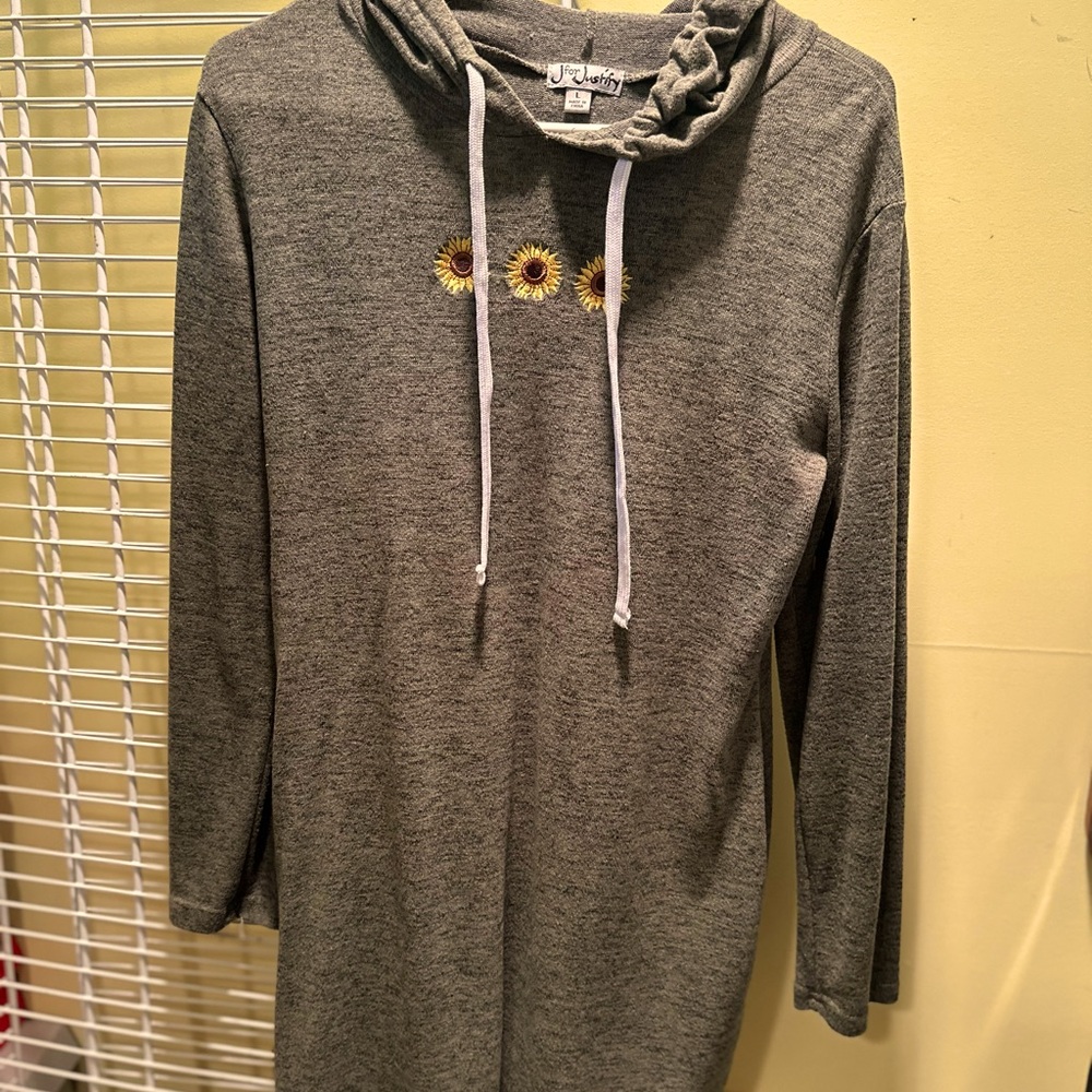 Olive green, long sleeve, hooded dress shirt with Sunflowers embroidered on it.